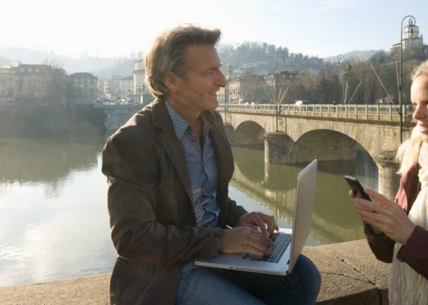 man-and-woman-have-a-business-meeting-on-a-bridge-picture-id1066453062-1044×587